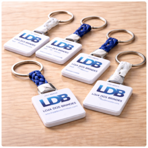 Branded keychains on wooden surface