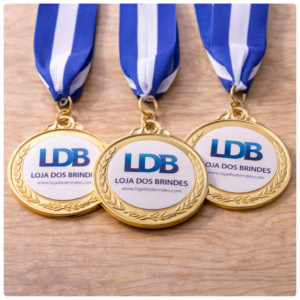 Golden medals on wooden surface